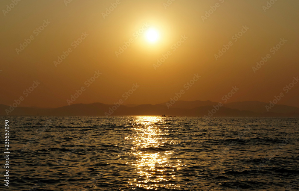 Seascape with beautiful sunset over the sea.