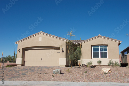 Tan Southwestern American Home