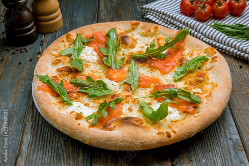 Pizza with salmon and Philadelphia cheese