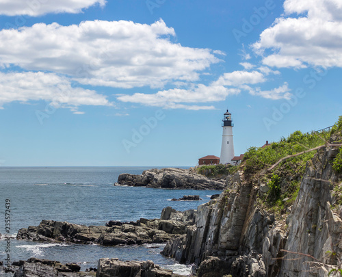 Lighthouse On A Rocky Shore