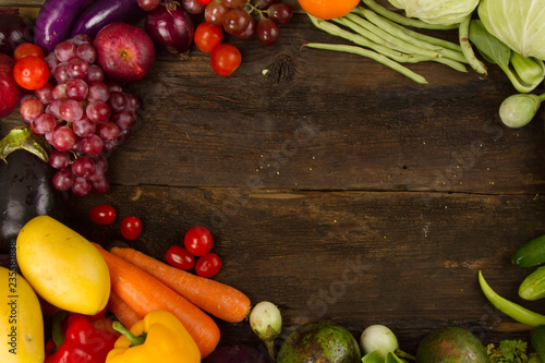 Vegetable and fruit frame on dark wooden plank background, Vegetable and Salad bar, Restaurant menu concept.