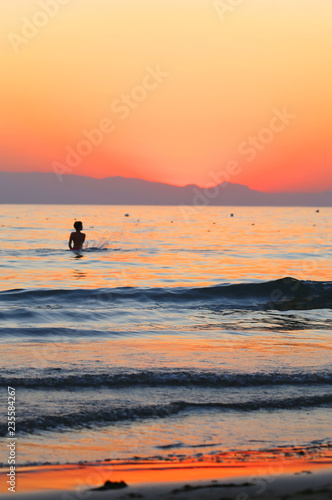 Photo background bright unusual sunset on the sea © tanor27