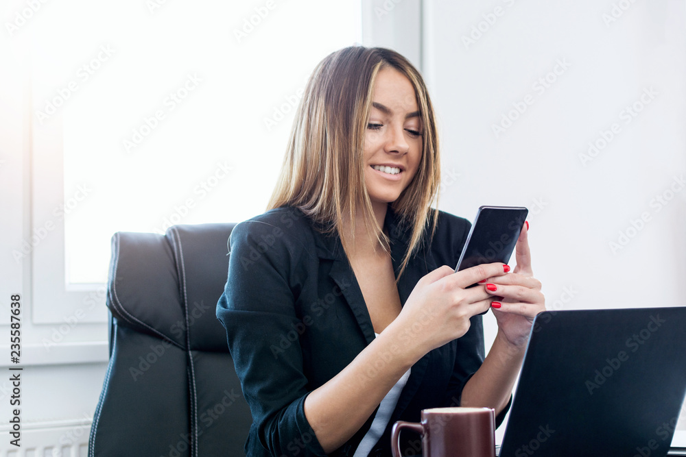 Beautiful girl having a break at work. Beautiful girl having a break at work.