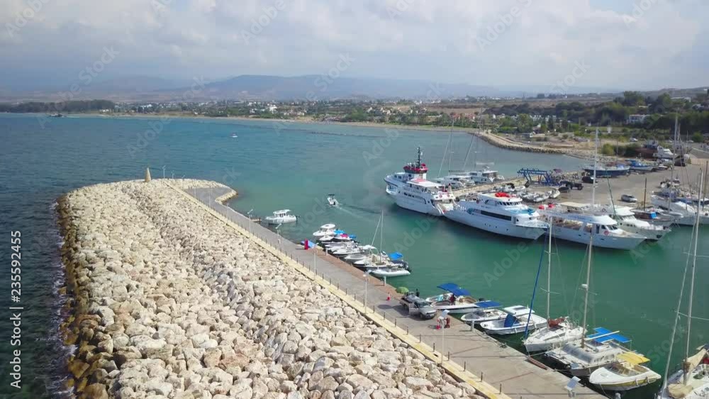 Aerial view port with yachts in sea near beach Latchi in Cyprus Aerial view port with yachts in sea near beach Latchi in Cyprus