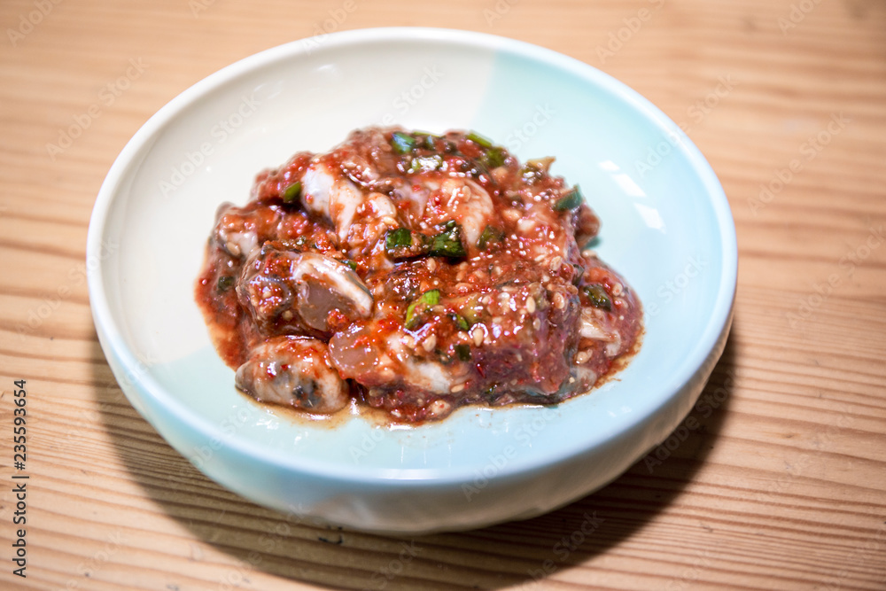 Gulhoemuchim, Spicy Raw Oysters Salad, Korean Food Gulhoemuchim, Spicy Raw Oysters Salad, Korean Food
