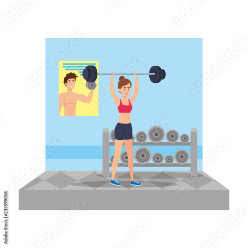 strong woman lifting weight in the gym