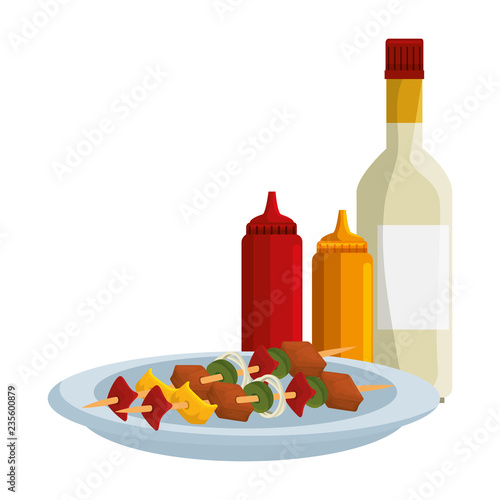 dish with delicious meat skewers and sauces