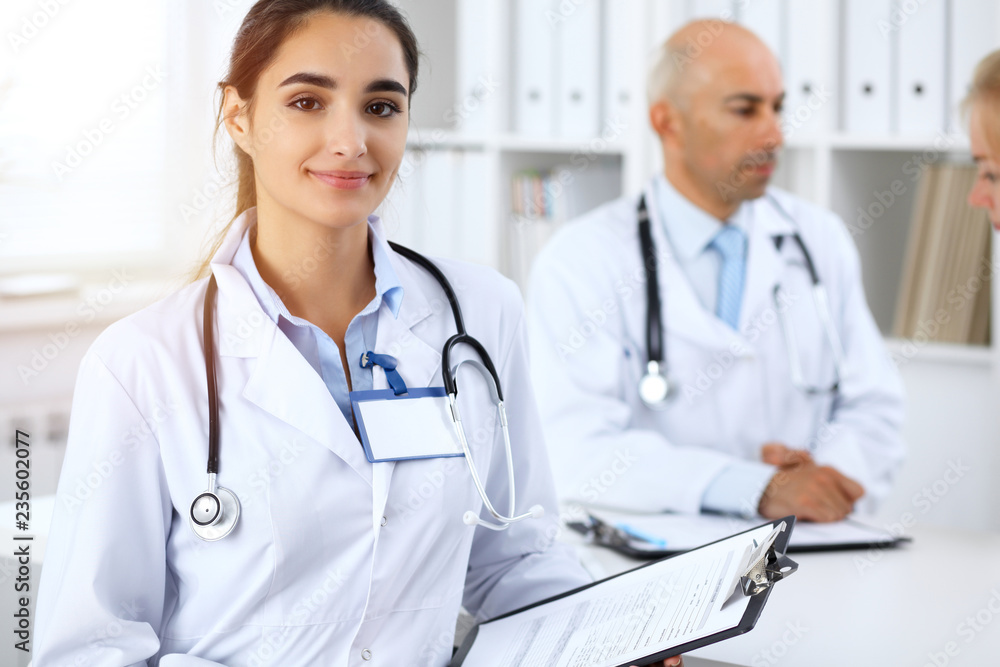 Portrait of young doctor woman  in hospital. Hispanic or latin american staff in medicine