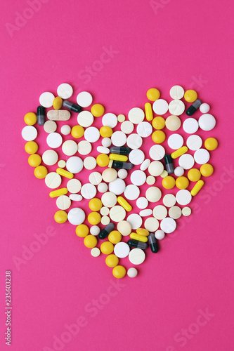 Medicine forming a sign of heart as a symbol of chemistry in love