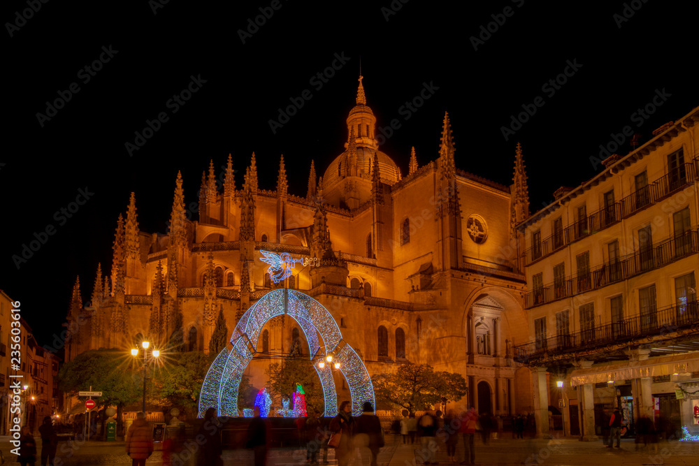  Christmas lights and decorations adorn  the square of cathedral in Segovia