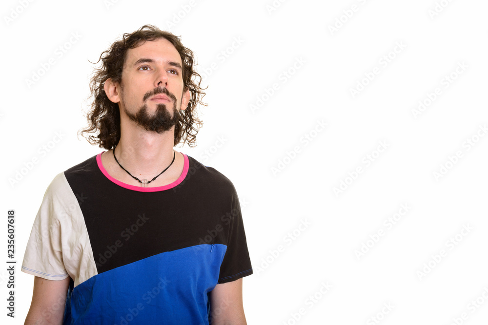 Portrait of handsome Caucasian man thinking and looking up Portrait of handsome Caucasian man thinking and looking up
