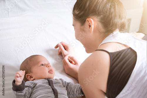 Portrait of happy mother and baby