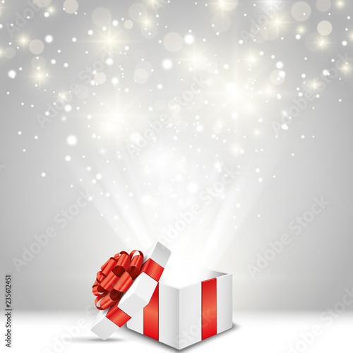 Opened gift box with red bow and lights Vector