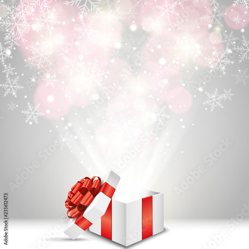 Opened gift box with red bow and snowflakes Vector