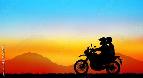 silhouette of lover couple in sunset with classic motorcycle © rathchapon