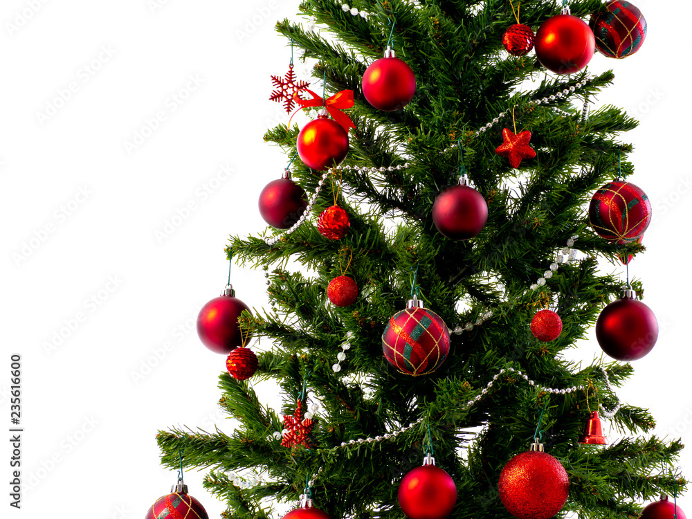 Big Christmas tree decorated with stars and beautiful red balls celebrate the festival. Big Christmas tree decorated with stars and beautiful red balls celebrate the festival.