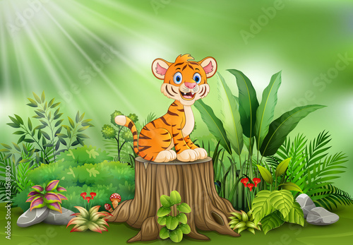 Fototapeta Naklejka Na Ścianę i Meble -  Cartoon happy tiger sitting on tree stump with green plants