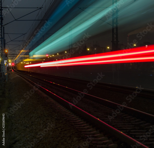Train light trail with red and blue light, long exposure