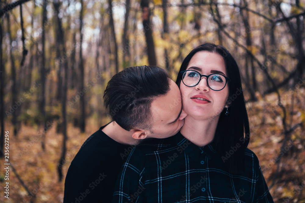 Fototapeta premium young man and woman in the autumn forest