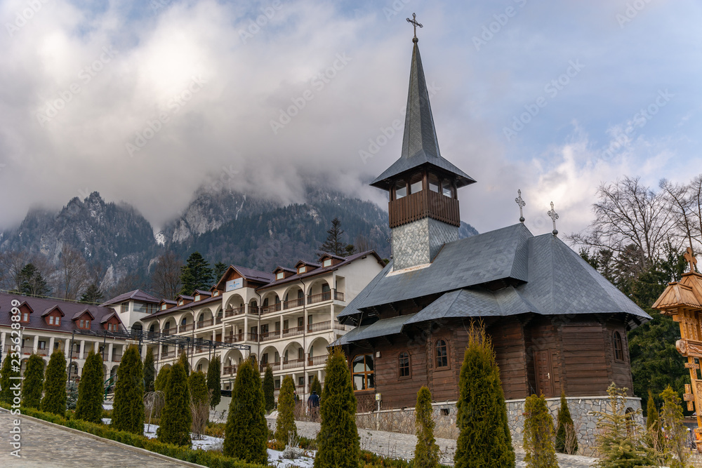 Caraiman Monastery between the mountains and mall wooden church