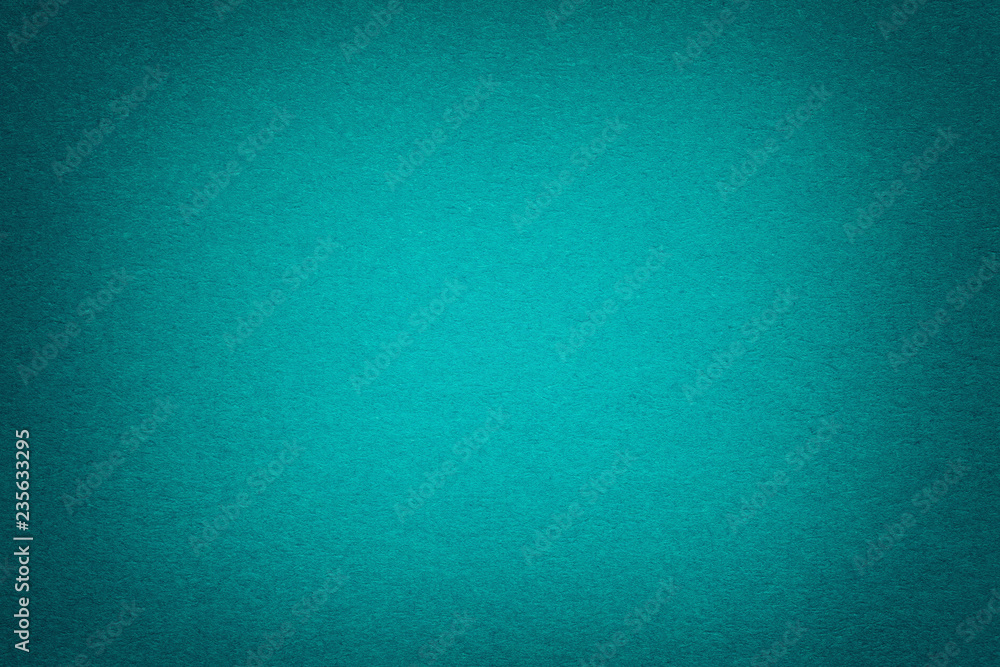 Texture of old dark turquoise paper background, closeup. Structure of dense emerald cardboard. Texture of old dark turquoise paper background, closeup. Structure of dense emerald cardboard.