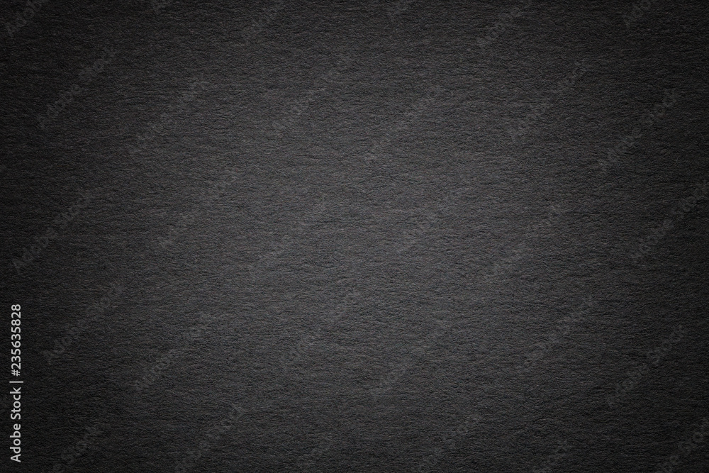 Texture of old dark black paper background, closeup. Structure of dense cardboard. Texture of old dark black paper background, closeup. Structure of dense cardboard.