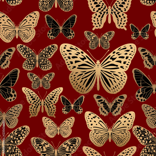 Seamless pattern. Gold and black butterflies on red background