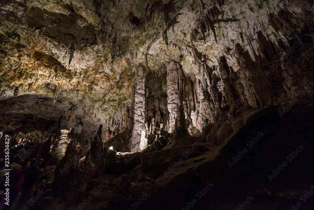 Interiors of Postojna Cave, Slovenia. Big caving area of Postojna. Underground halls, karst. Interiors of Postojna Cave, Slovenia. Big caving area of Postojna. Underground halls, karst.