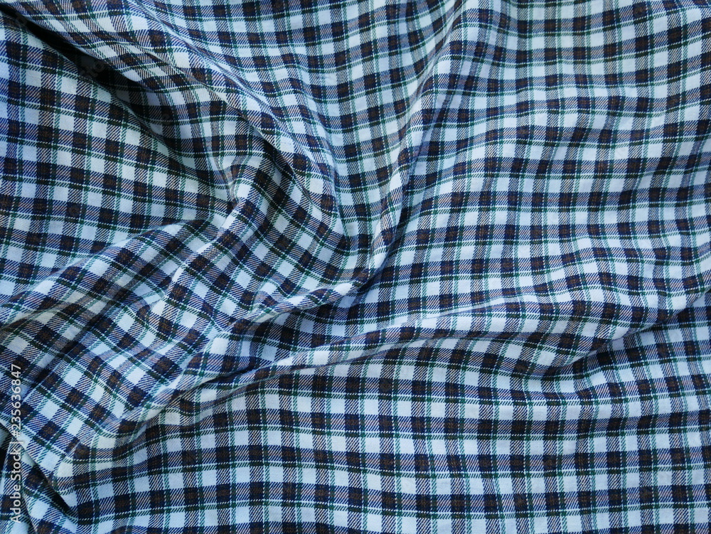 Square pattern fabric background. Scott chintz fabric for design.Plaid cotton texture. Square pattern fabric background. Scott chintz fabric for design.Plaid cotton texture.