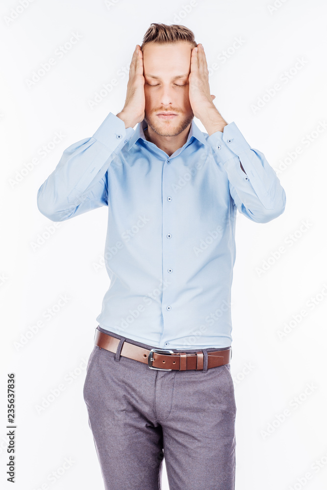 Man on a white studio background. emotions and people concept.