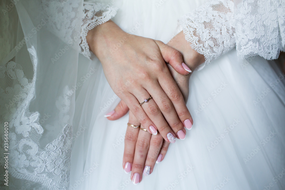 Bride and groom hands with wedding rings Bride and groom hands with wedding rings