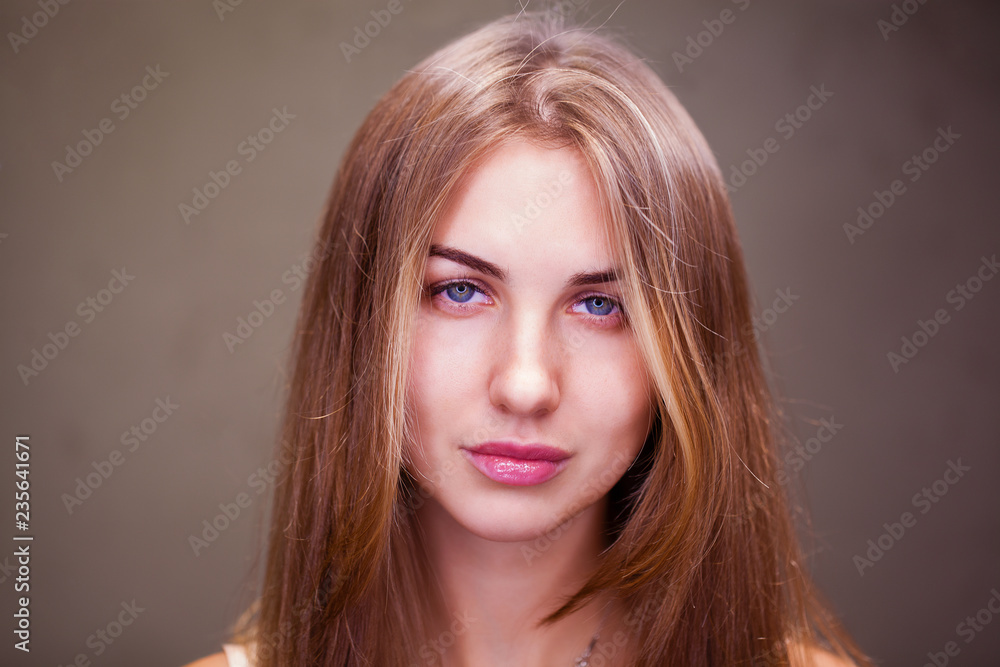 Naklejka premium Young blonde woman without makeup
