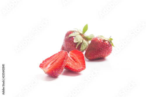 Strawberry fresh ripe sweet berry with sliced half isolated on white.