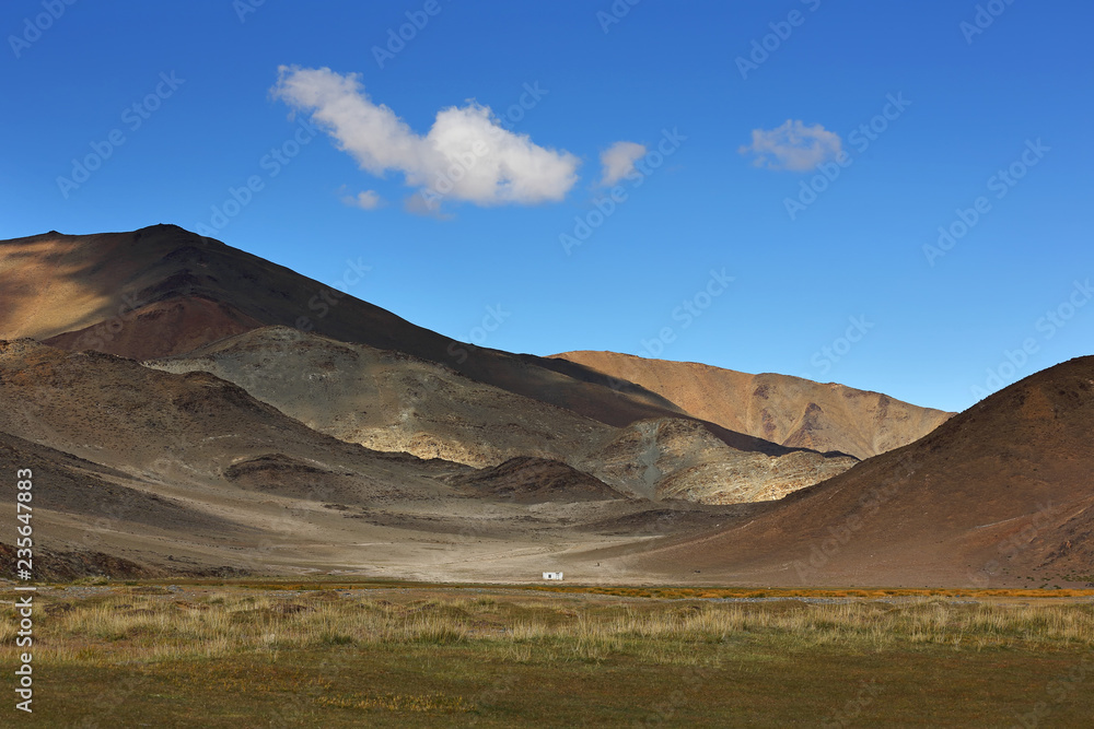 Beautiful views of the steppe and mountains with sky blue or clouds of Western Mongolia