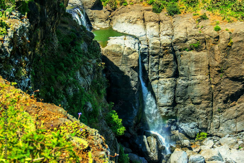 Fototapeta premium small waterfall in the mountains of Africa