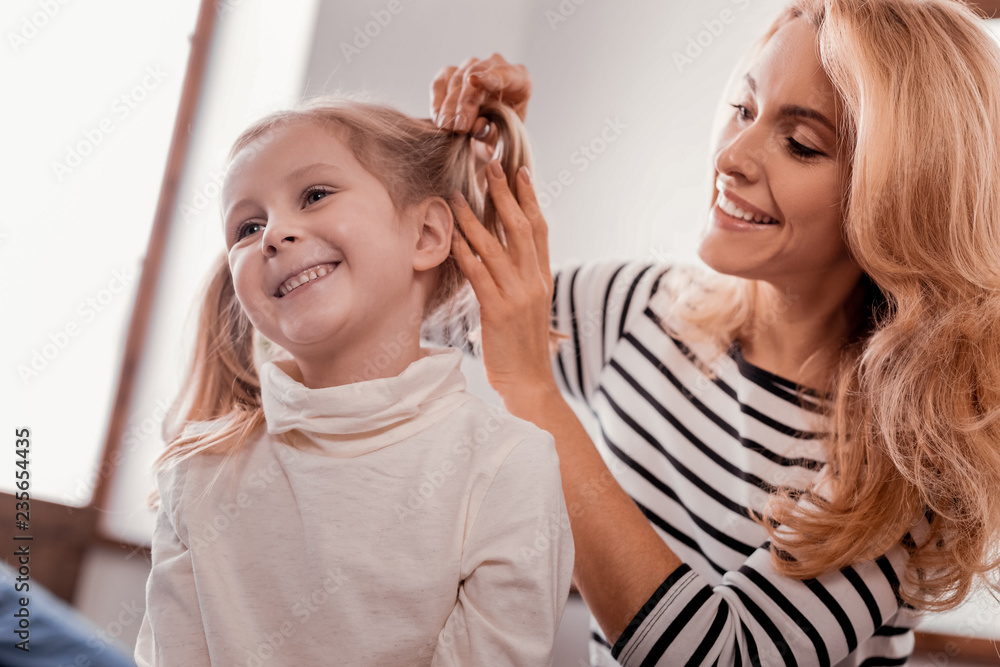 Attractive lady spending time with a kid Attractive lady spending time with a kid