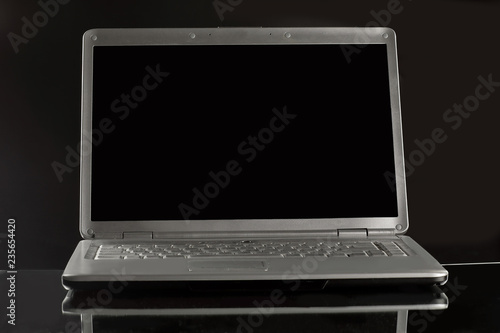 Wallpaper Mural close up. stylish notebook with blank black screen .photo with c Torontodigital.ca