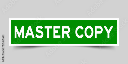 Square green sticker label in word master copy on gray background