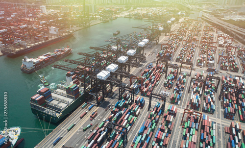 International supply chain commercial logistics industry Aerial view cargo containers in container park of Hong Kong. Global trade networks photo