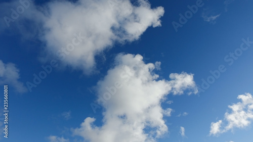 Clouds on a blue sky in cold winter day