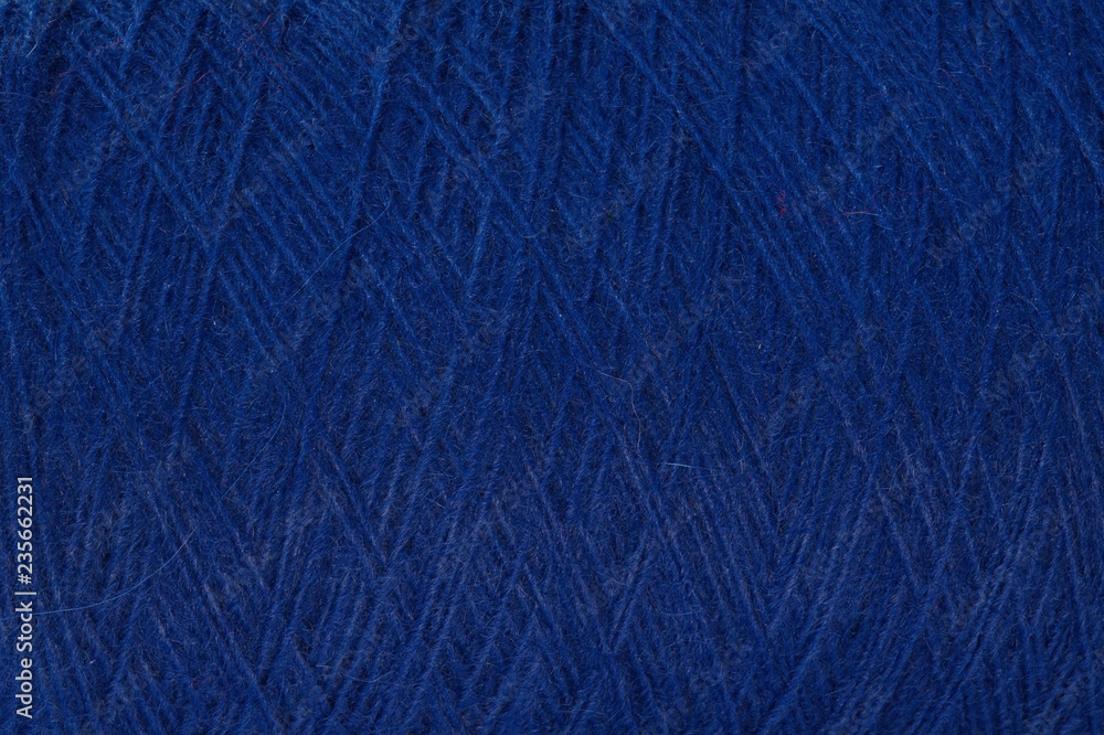 Alpaca wool yarn glowing blue background Alpaca wool yarn glowing blue background