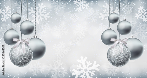 Silver shiny glitter baubles on snowflakes background Vector realistic. Chris...