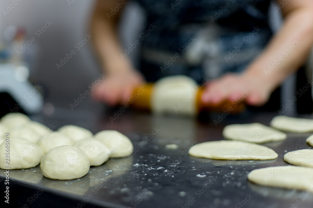 different kinds of pastry are being cooked