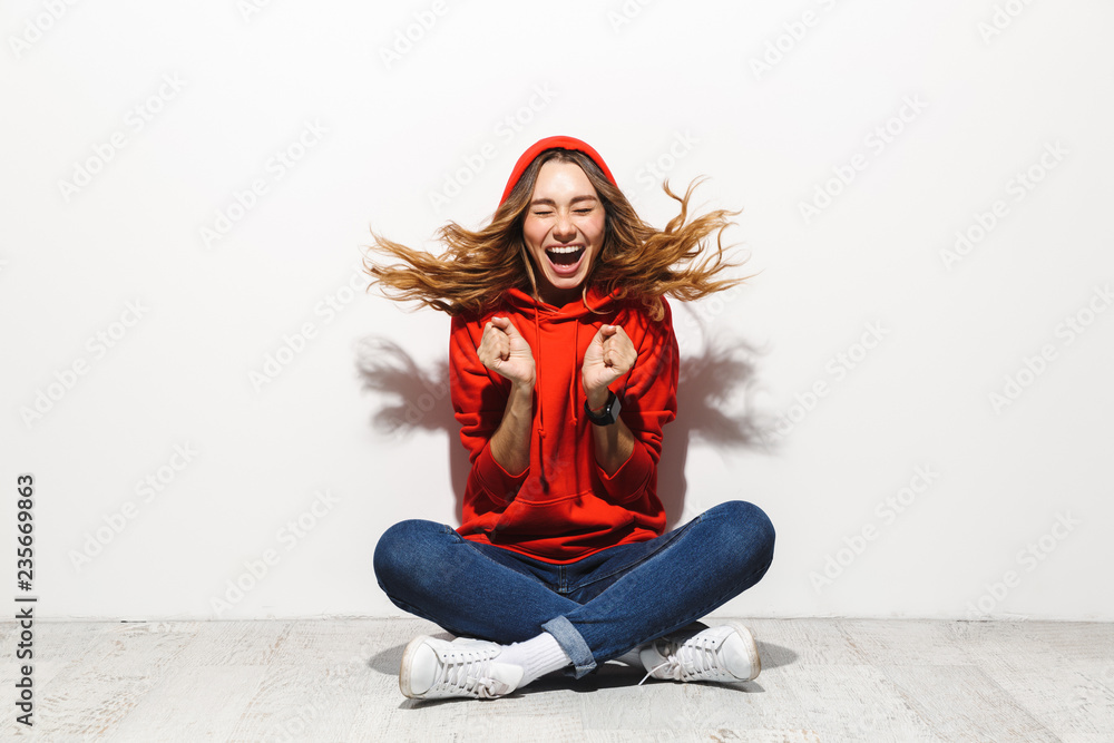 Portrait of an excited girl wearing hoodie Portrait of an excited girl wearing hoodie
