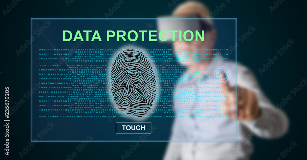 Fototapeta premium Man touching a data protection concept