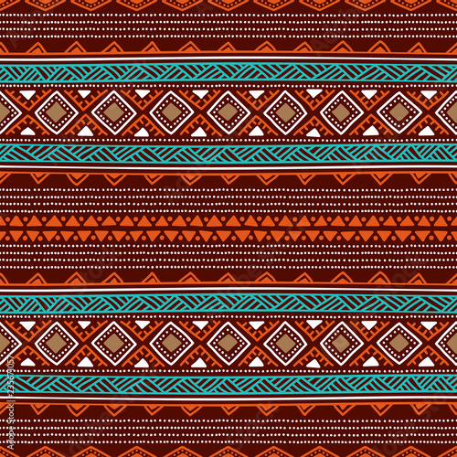 Seamless ethnic background. Striped wallpaper hand-drawn. Blue, orange and white elements on a brown backdrop. Vector illustration.