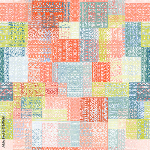 Seamless pattern in patchwork style. Multi-colored square patches. Grungy vintage geometric pattern. Ethnic and tribal motifs. Blue, white, green, pink and coral colors. Vector illustrations.