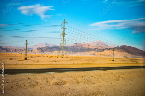 Power lines passing through the mountains of Egypt