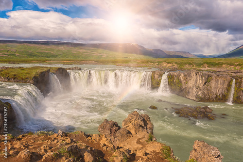 Godafoss  Akureyri  waterfall at sunny day  spectacular landscape of Iceland iconic place with blue cloudy sky. Skjalfandafljot river  Nor  urland  North of Iceland
