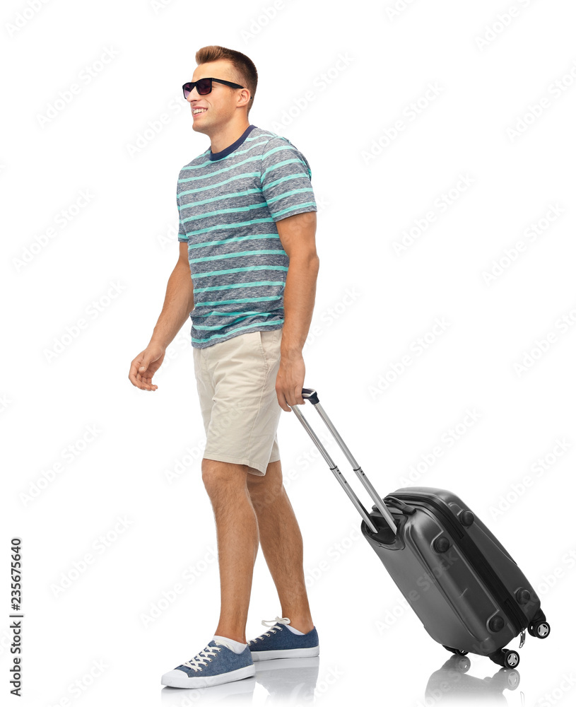 tourism, summer holidays and vacation concept - smiling young man in sunglasses with travel bag over white background tourism, summer holidays and vacation concept - smiling young man in sunglasses with travel bag over white background